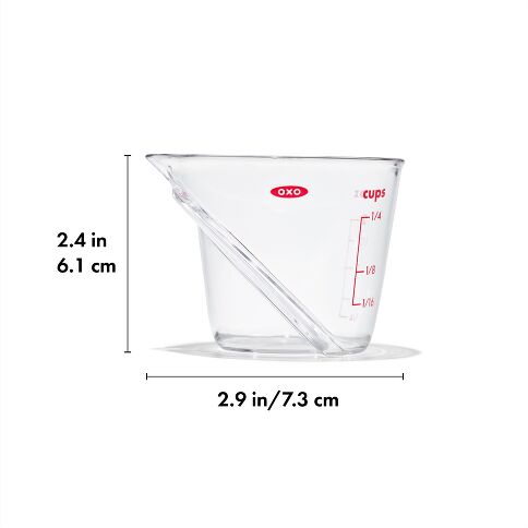 Clear measuring cup with red measurement markings and OXO logo, shown with dimensions on a white background.