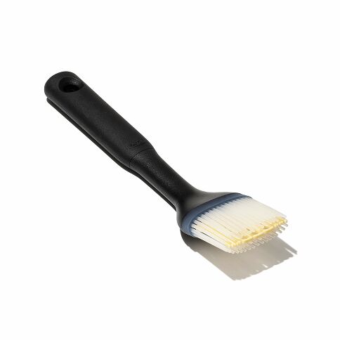 Black pastry brush with bristle head on a white background
