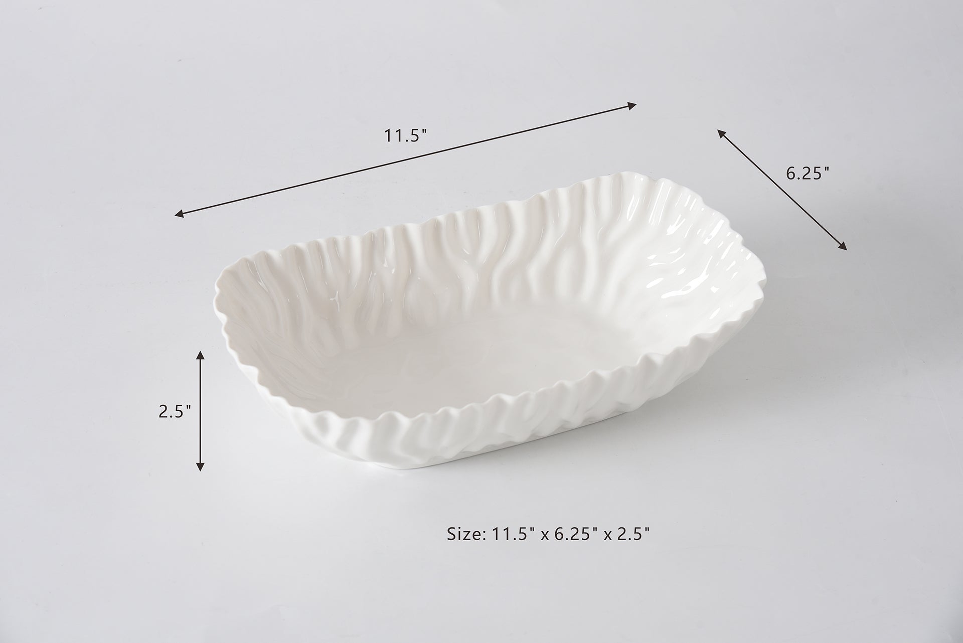 White ceramic bowl with textured surface and dimensions on a light gray background