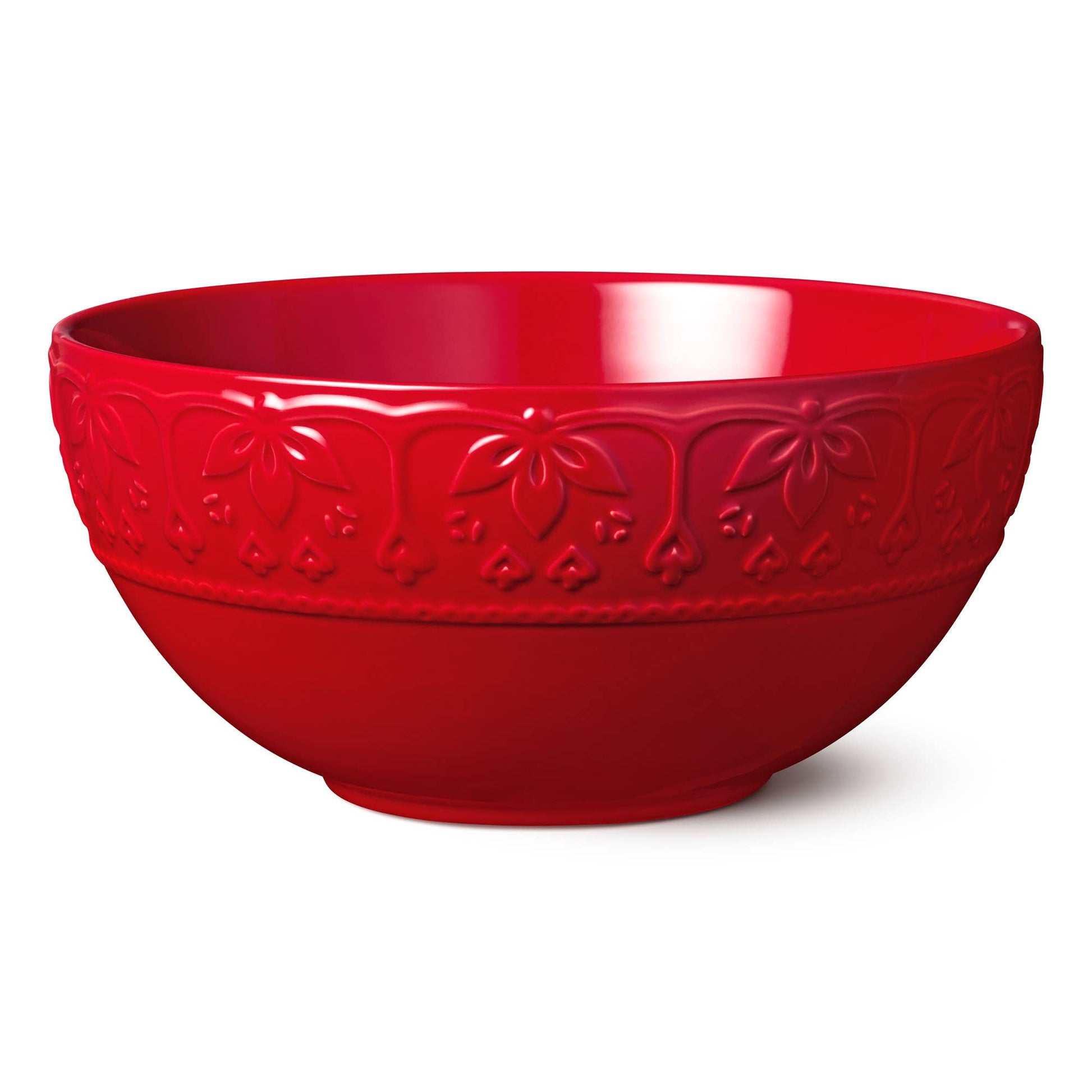 Red ceramic bowl with embossed design on a white background