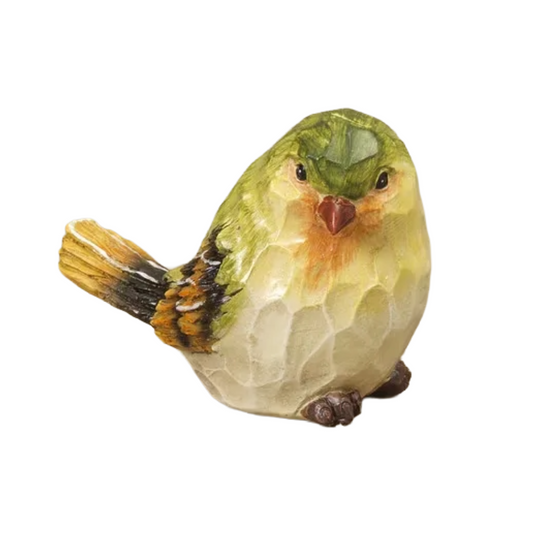 Colorful bird figurine on a white background