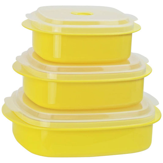 Set of yellow silicone containers with lids on a white background