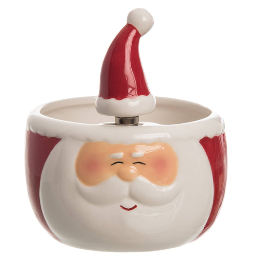 Ceramic jar shaped like a Santa Claus face with a red hat on a white background