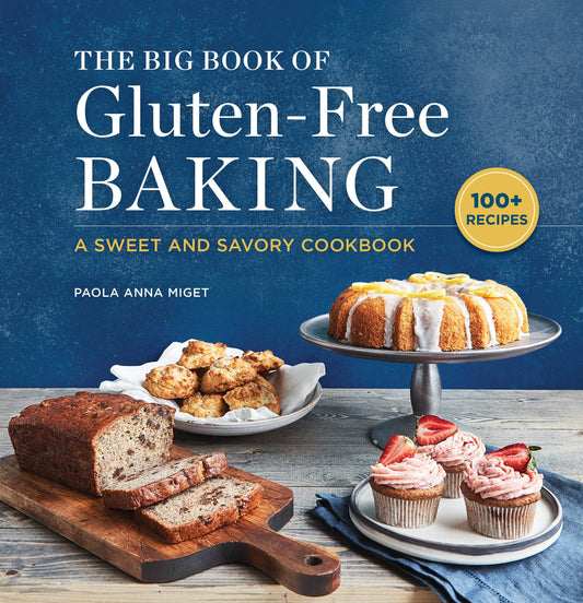 Book cover of 'The Big Book of Gluten-Free Baking' with baked goods on a table.