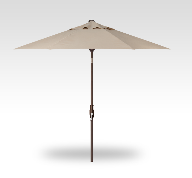 Beige patio umbrella on a white background