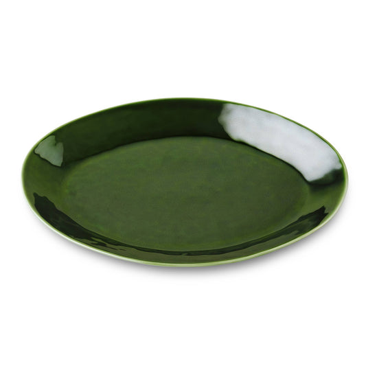 Green ceramic platter on a white background