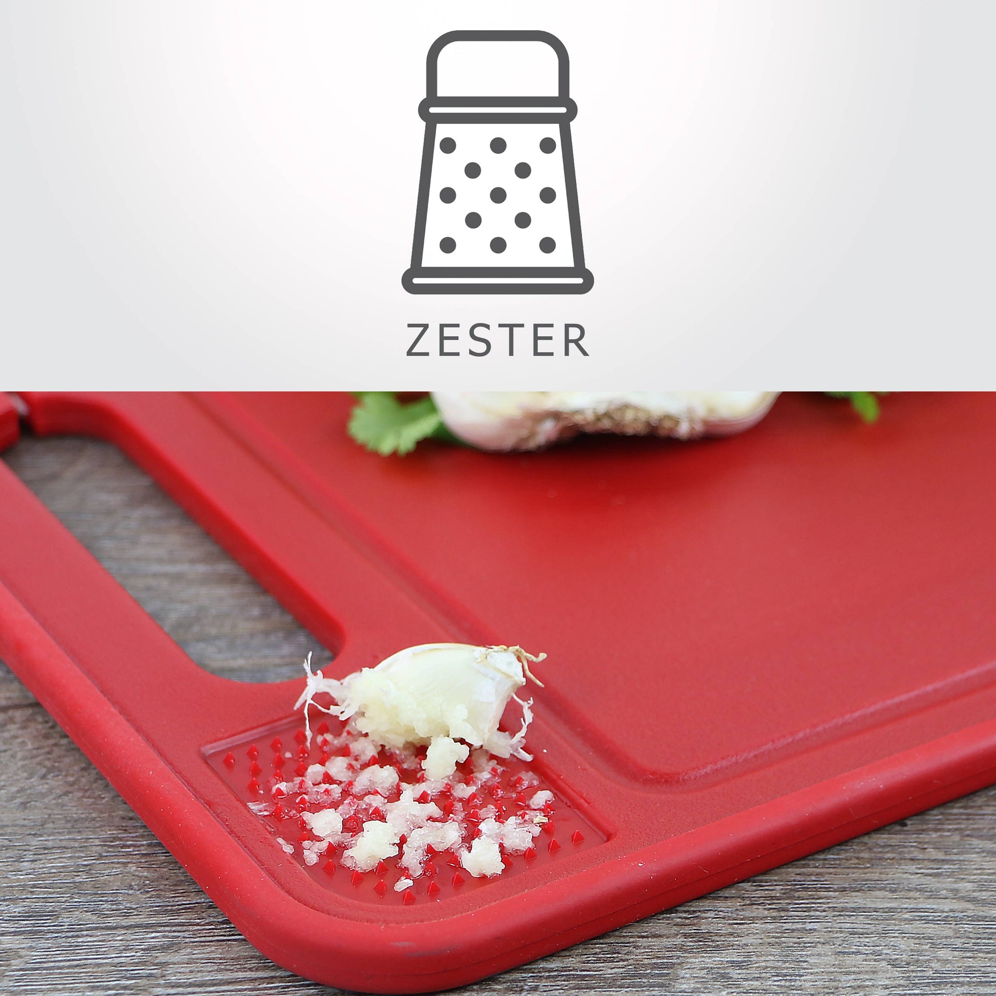 Red zester with grated white substance on a Reston Lloyd All-in-One Cutting Board/Defroster