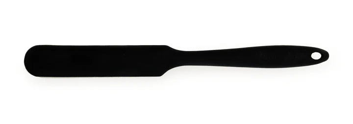 Black spatula on a white background