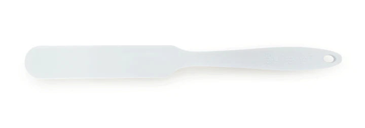 White spatula on a white background