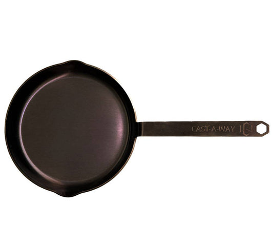 Carbon steel skillet with handle on a white background