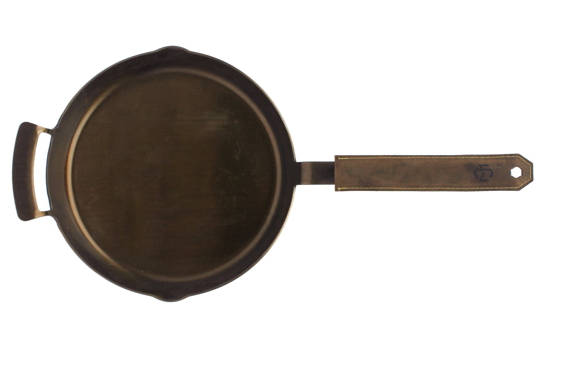 Black cast iron skillet with a handle on a white background