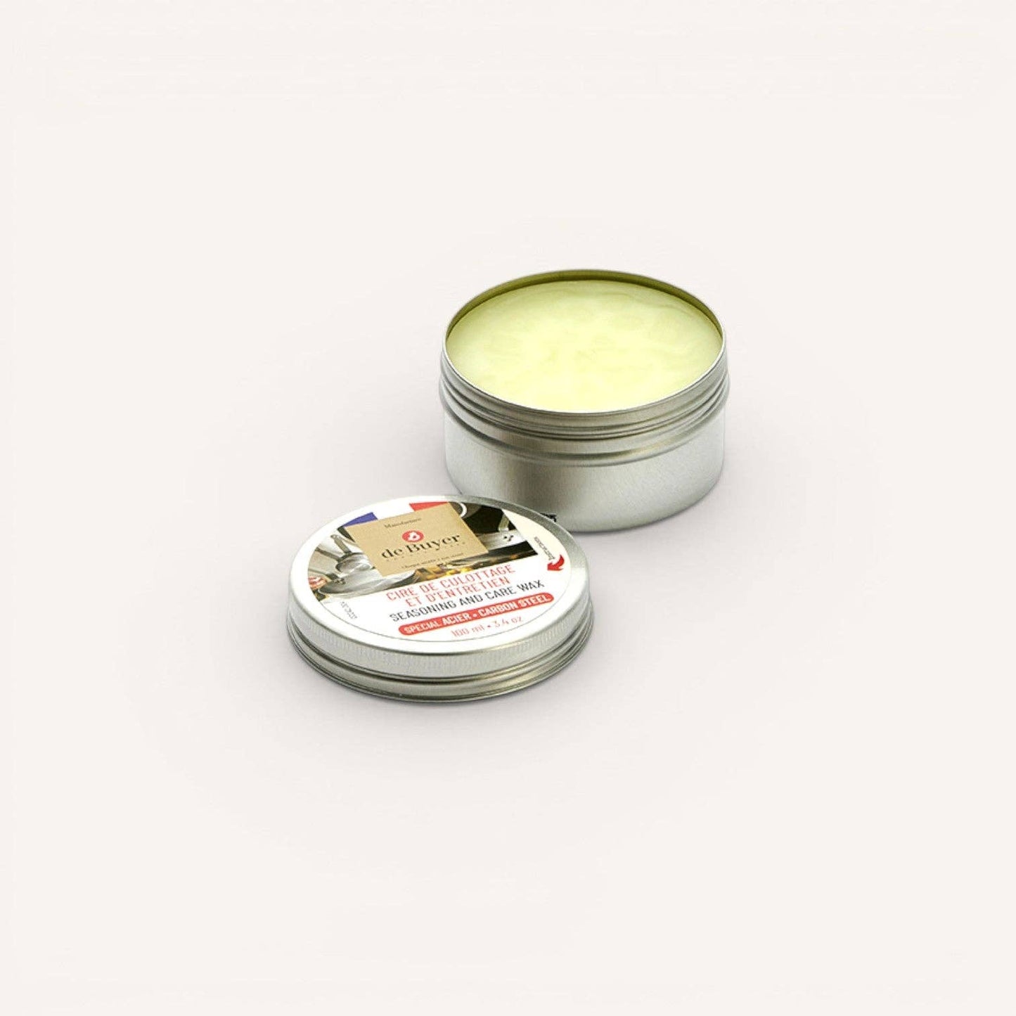 An open tin of de Buyer Seasoning and Care Wax