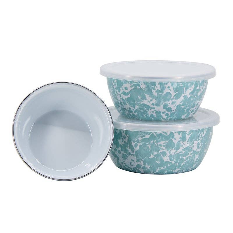 Set of two blue patterned bowls with lids on a white background