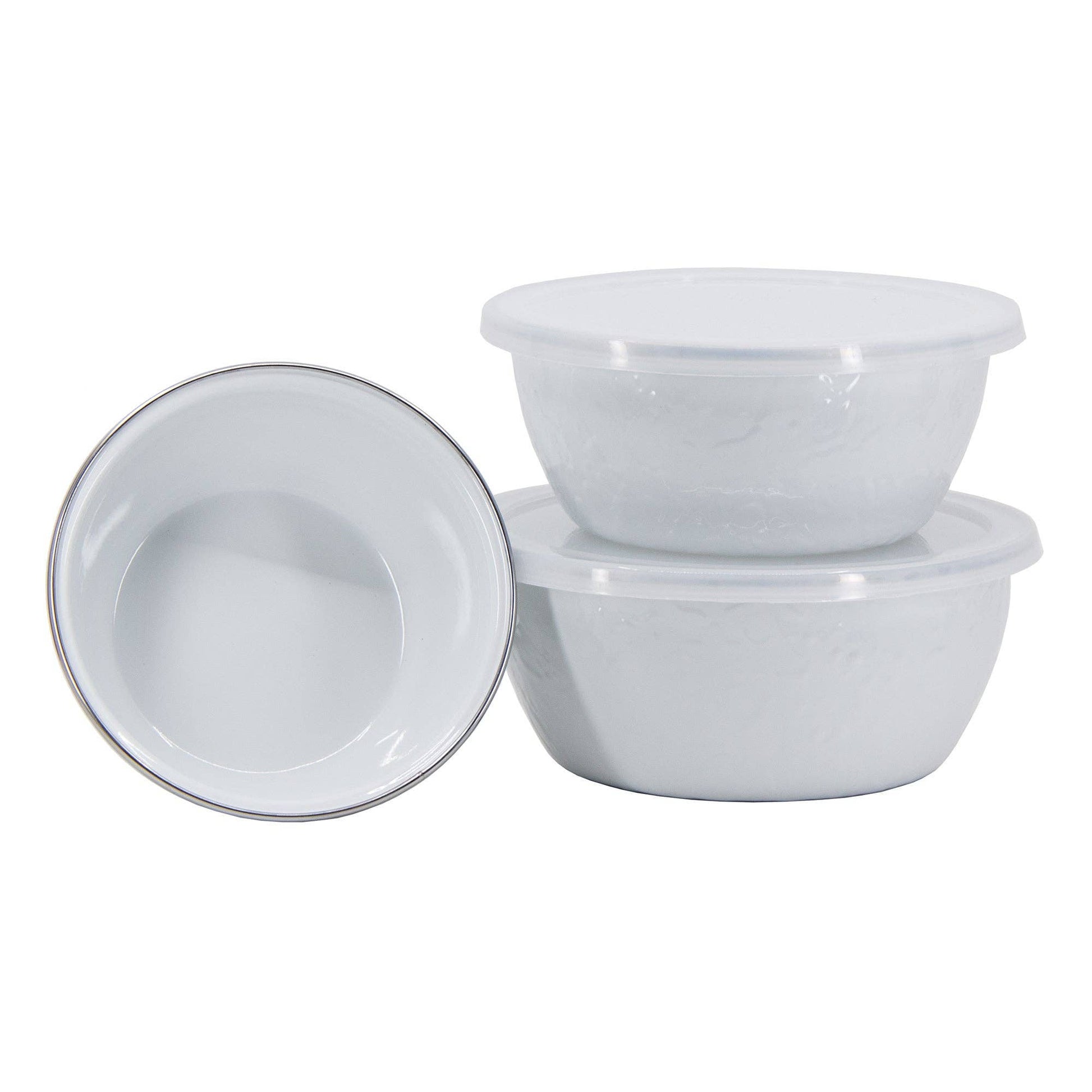 Set of white porcelain enamel bowls on a white background