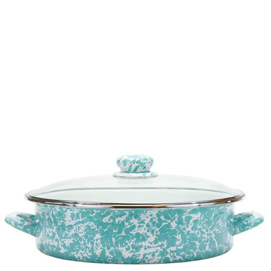 Turquoise and white patterned casserole dish with lid on a white background