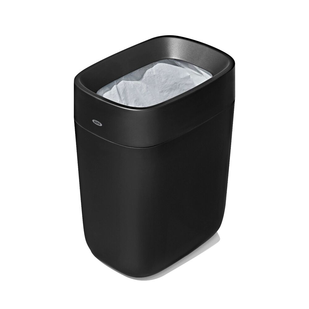 OXO Good Grips Black trash bin with a white liner on a white background