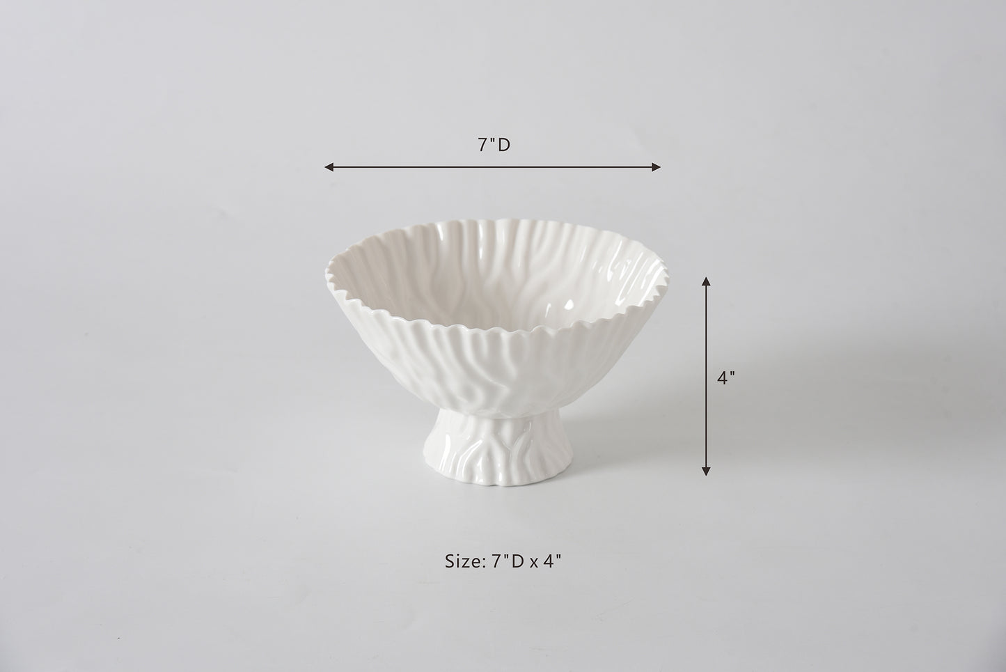 White decorative bowl with dimensions on a gray background