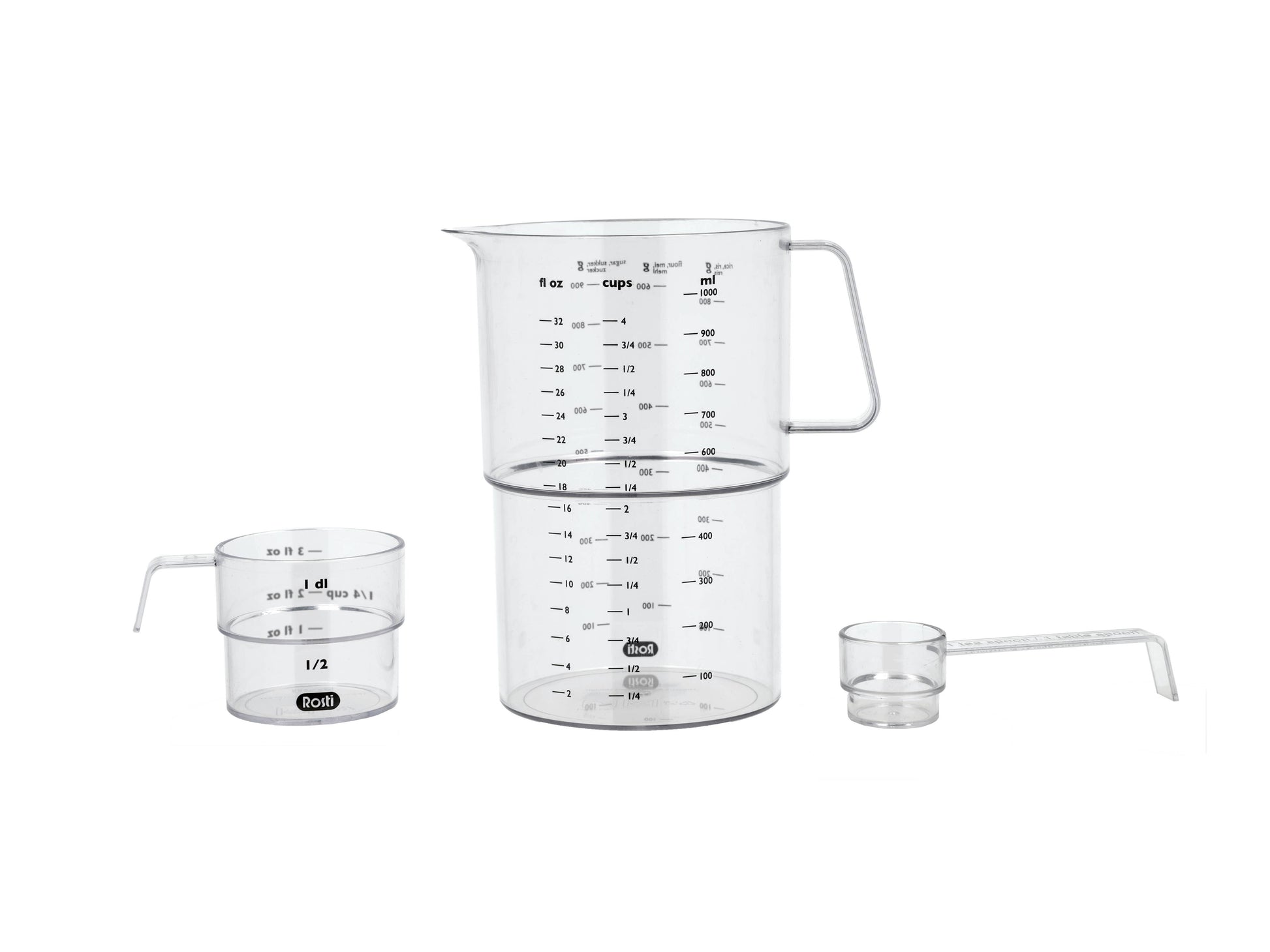 Set of glass measuring cups with handles on a white background