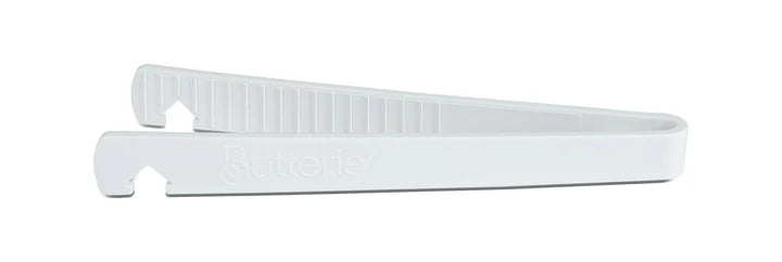 White toaster tong on a white background